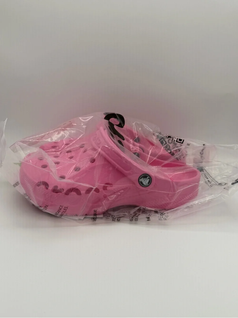 CROCS Kids Classic Clogs in Hot Pink